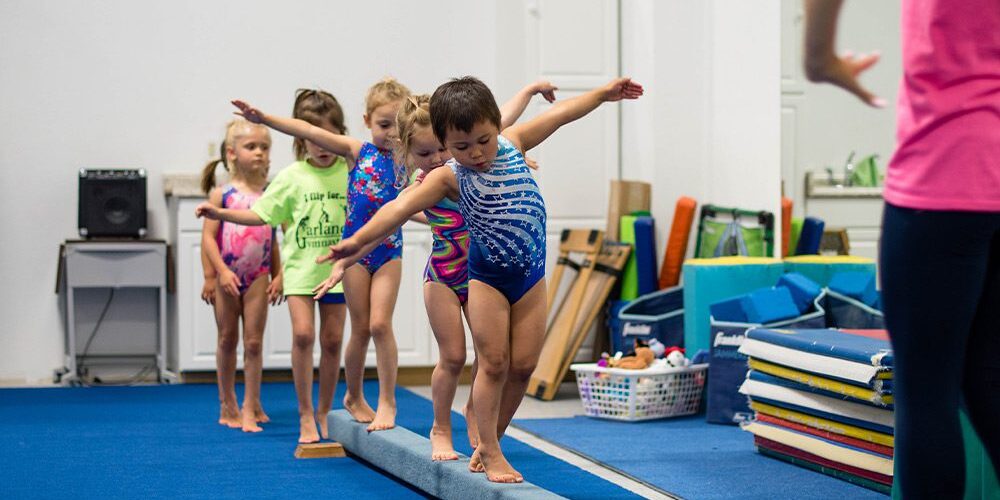 kids on balance beam