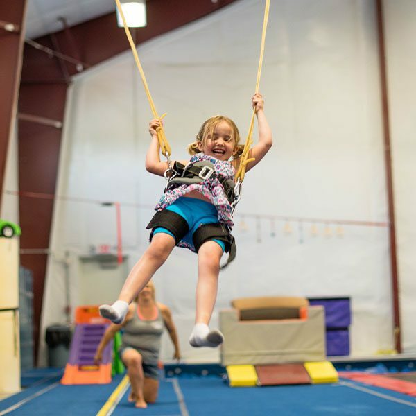 little girl on swing